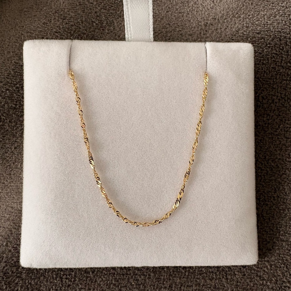 10K Italian Gold Singapore Chain Bracelet – 7”, 1.1mm